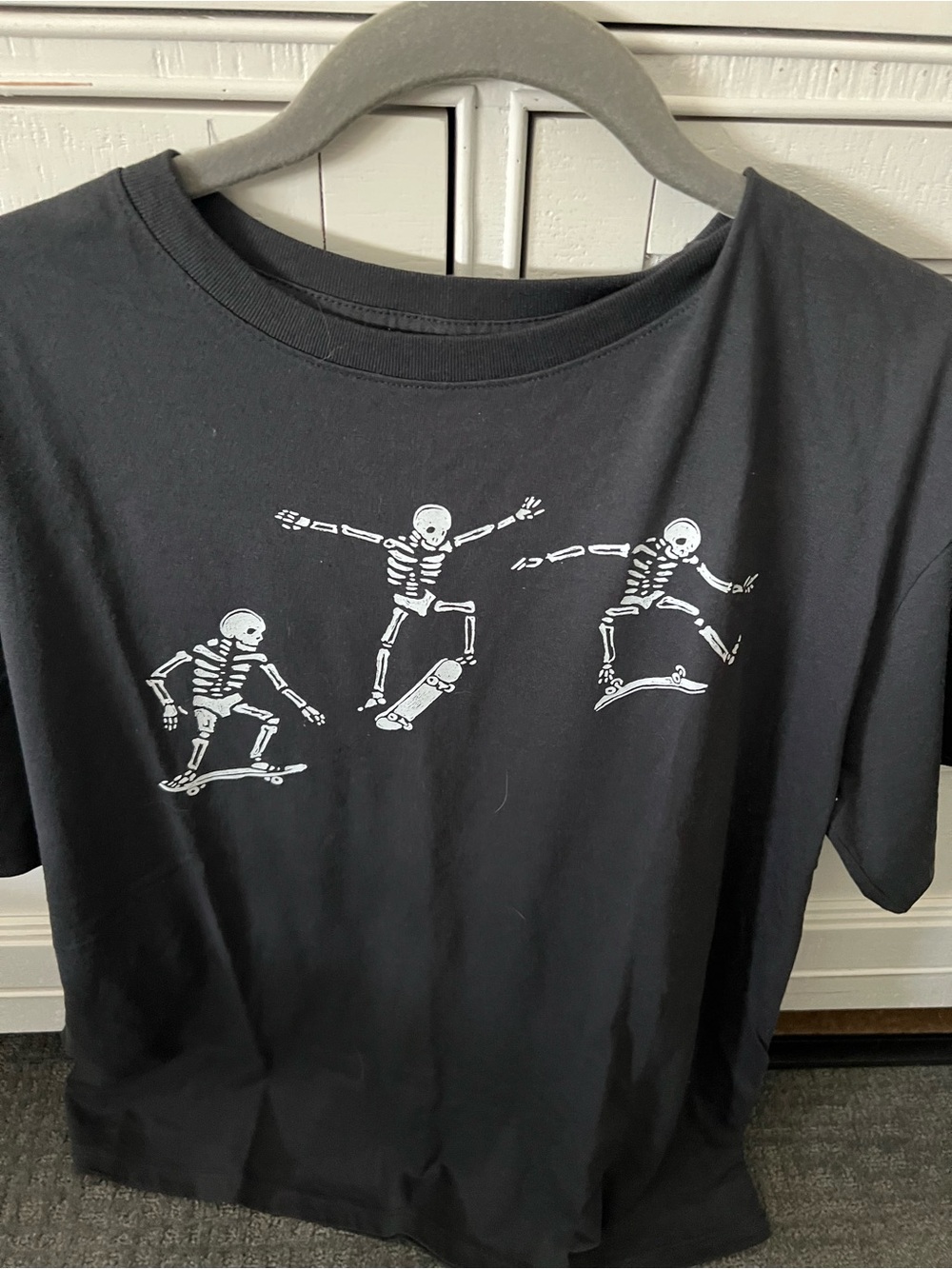 Black Graphic Tee with Skateboarding Skeletons